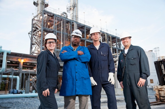 Workers at manufacturing plant